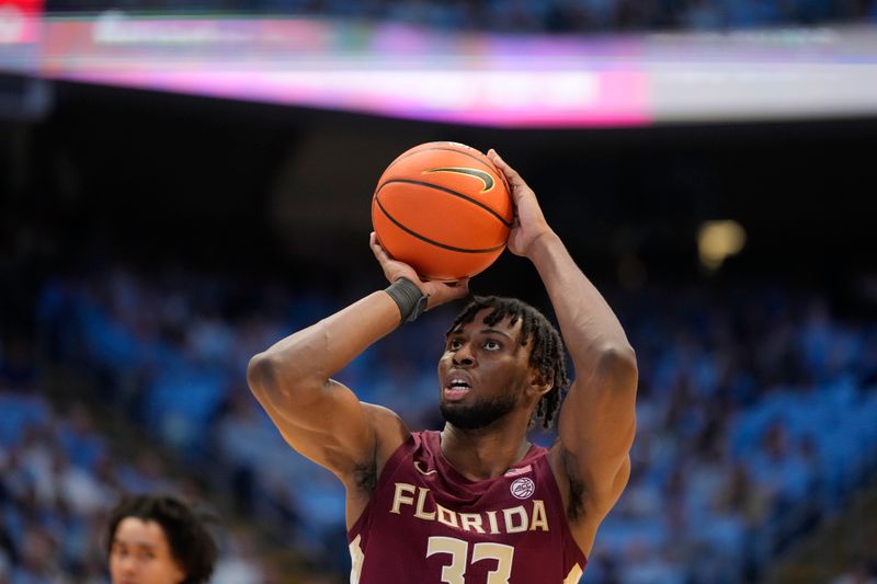 Dec 2, 2023; Chapel Hill, North Carolina, USA;  Florida State Seminoles forward Jaylan Gainey (33) shoots in the first half at Dean E. Smith Center. Mandatory Credit: Bob Donnan-USA TODAY Sports