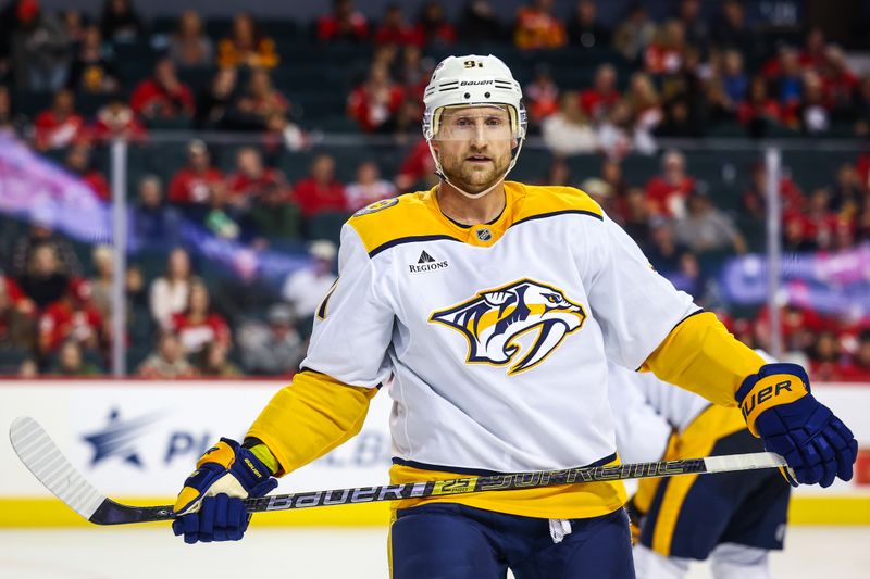 Nov 15, 2024; Calgary, Alberta, CAN; Nashville Predators center Steven Stamkos (91) during the face off against the Calgary Flames during the third period at Scotiabank Saddledome. Mandatory Credit: Sergei Belski-Imagn Images