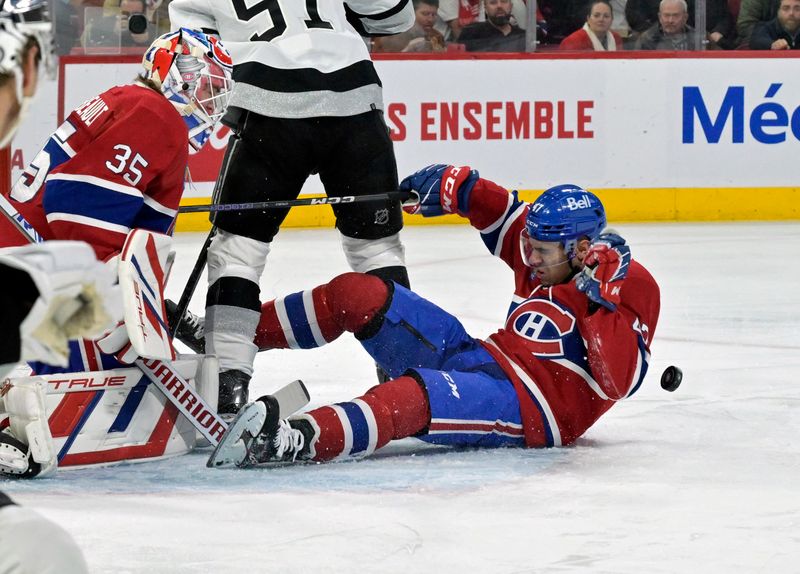 Dec 7, 2023; Montreal, Quebec, CAN; Montreal Canadiens defenseman Jayden Struble (47) blocks a shot in front of teammate goalie Sam Montembeault (35) during the first period of the game against the Los Angeles Kings at the Bell Centre. Mandatory Credit: Eric Bolte-USA TODAY Sports