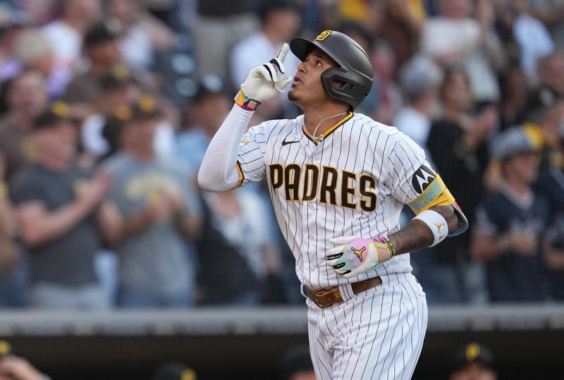 Jul 25, 2023; San Diego, California, USA;  San Diego Padres third baseman Manny Machado (13) reacts to his home run against the Pittsburgh Pirates during the second inning at Petco Park. Mandatory Credit: Ray Acevedo-USA TODAY Sports