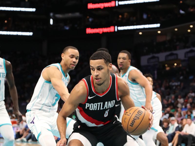 CHARLOTTE, NC - APRIL 3:  Kris Murray #8 of the Portland Trail Blazers drives to the basket during the game against the Charlotte Hornets on April 3, 2024 at Spectrum Center in Charlotte, North Carolina. NOTE TO USER: User expressly acknowledges and agrees that, by downloading and or using this photograph, User is consenting to the terms and conditions of the Getty Images License Agreement.  Mandatory Copyright Notice:  Copyright 2024 NBAE (Photo by Brock Williams-Smith/NBAE via Getty Images)