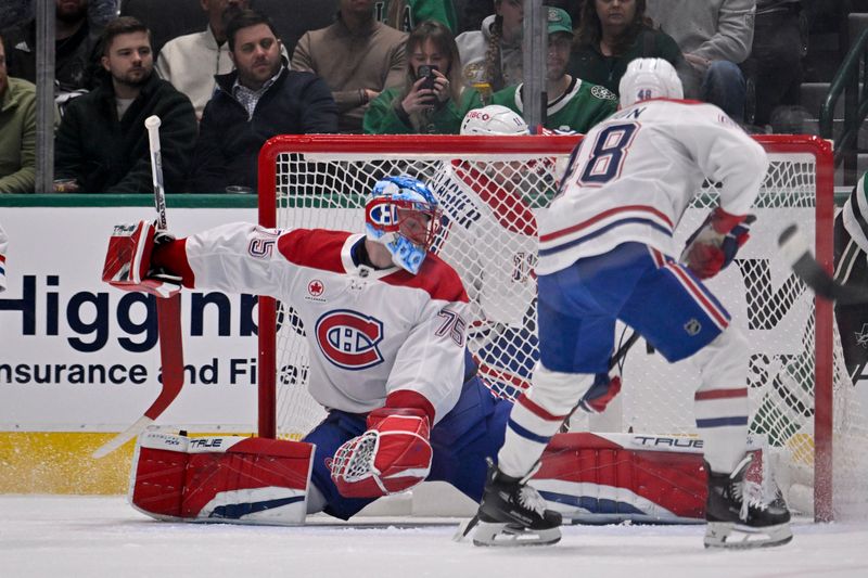 Jan 16, 2025; Dallas, Texas, USA; Montreal Canadiens goaltender Jakub Dobes (75) faces the Dallas Stars attack during the first period at the American Airlines Center. Mandatory Credit: Jerome Miron-Imagn Images