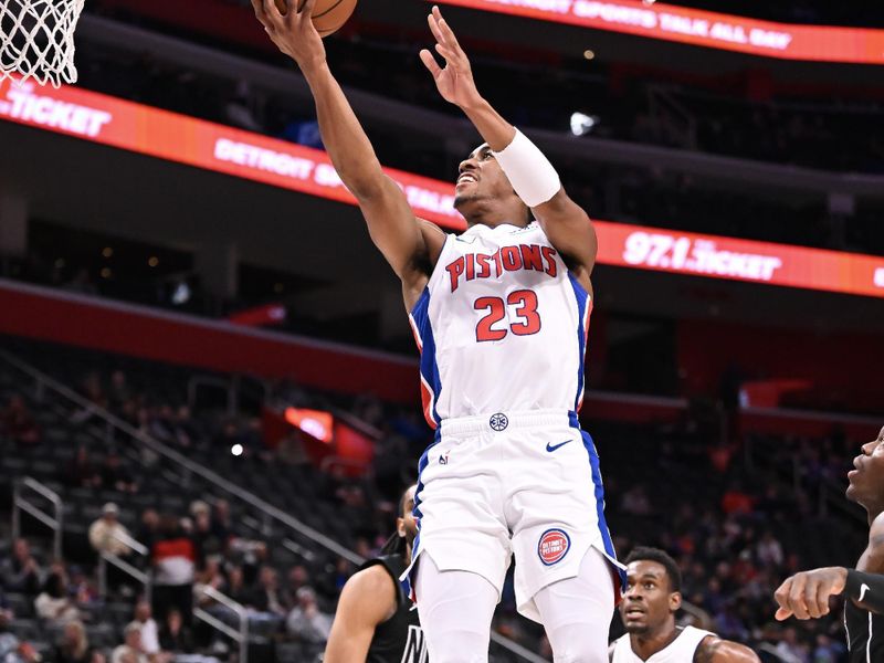 DETROIT, MICHIGAN - MARCH 07: Jaden Ivey #23 of the Detroit Pistons shoots the ball during the first half against the Brooklyn Nets at Little Caesars Arena on March 07, 2024 in Detroit, Michigan. NOTE TO USER: User expressly acknowledges and agrees that, by downloading and or using this photograph, User is consenting to the terms and conditions of the Getty Images License Agreement. (Photo by Luke Hales/Getty Images)