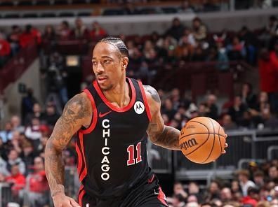 CHICAGO, IL - DECEMBER 21: DeMar DeRozan #11 of the Chicago Bulls dribbles the ball during the game against the San Antonio Spurs on December 21, 2023 at United Center in Chicago, Illinois. NOTE TO USER: User expressly acknowledges and agrees that, by downloading and or using this photograph, User is consenting to the terms and conditions of the Getty Images License Agreement. Mandatory Copyright Notice: Copyright 2023 NBAE (Photo by Jeff Haynes/NBAE via Getty Images)