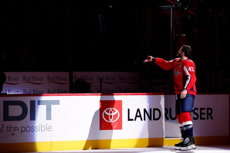Mar 31, 2026; Washington, District of Columbia, USA; Washington Capitals right wing Tom Wilson (43) tosses a puck in the stands after being named number one star of the game against the Philadelphia Flyers at Capital One Arena. Mandatory Credit: Geoff Burke-Imagn Images Mar 31, 2026; Washington, District of Columbia, USA; Washington Capitals right wing Tom Wilson (43) tosses a puck in the stands after being named number one star of the game against the Philadelphia Flyers at Capital One Arena. Mandatory Credit: Geoff Burke-Imagn Images