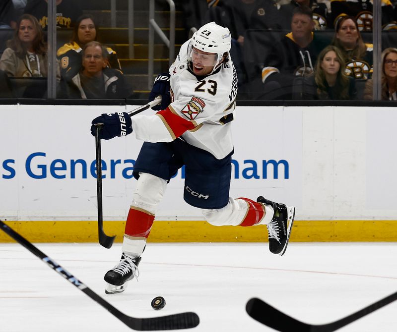 Oct 21, 2025; Boston, Massachusetts, USA; Florida Panthers center Carter Verhaeghe (23) breaks his stick on a shot against the Boston Bruins during the first period at TD Garden. Mandatory Credit: Winslow Townson-Imagn Images