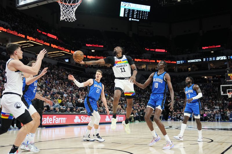 MINNEAPOLIS, MN -  FEBRUARY 3: Naz Reid #11 of the Minnesota Timberwolves drives to the basket during the game against the Orlando Magic on February 3, 2023 at Target Center in Minneapolis, Minnesota. NOTE TO USER: User expressly acknowledges and agrees that, by downloading and or using this Photograph, user is consenting to the terms and conditions of the Getty Images License Agreement. Mandatory Copyright Notice: Copyright 2022 NBAE (Photo by Jordan Johnson/NBAE via Getty Images)