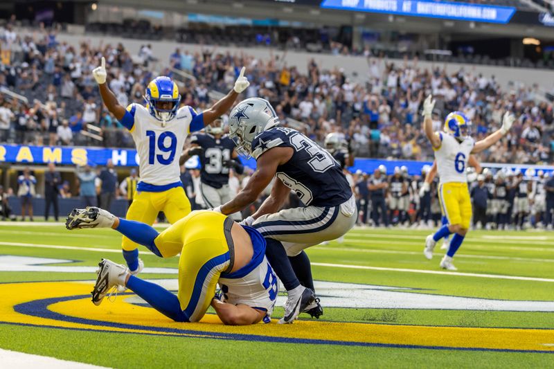 Los Angeles Rams tight end Miller Forristall (82) catches a touchdown to defeat the Dallas Cowboys in an NFL preseason football game, Sunday, Aug.11, 2024, in Inglewood, Calif. Rams defeated the Cowboys 13-12. (AP Photo/Jeff Lewis)