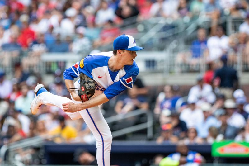 Jun 29, 2024; Cumberland, Georgia, USA; Atlanta Braves pitcher Max Fried (54) pitches the ball against Pittsburgh Pirates during the first inning at Truist Park. Mandatory Credit: Jordan Godfree-USA TODAY Sports