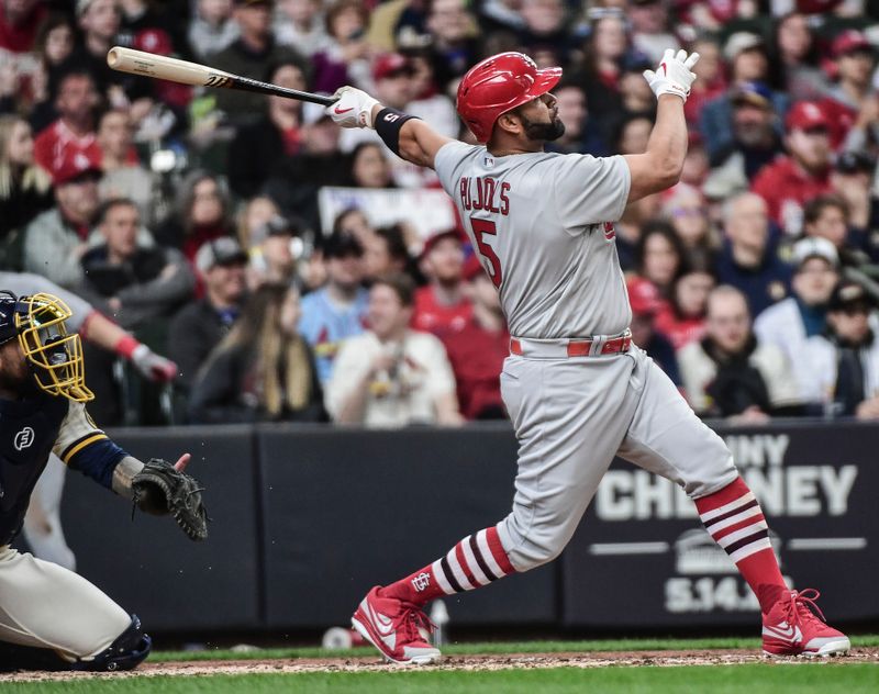 Apr 17, 2022; Milwaukee, Wisconsin, USA; St. Louis Cardinals designated hitter Albert Pujols (5) hits a 3-run homer in the third inning during game against the Milwaukee Brewers at American Family Field. Mandatory Credit: Benny Sieu-USA TODAY Sports