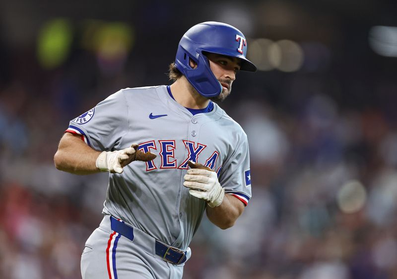 Jul 14, 2024; Houston, Texas, USA; Texas Rangers third baseman Josh Smith (8) runs the bases after hitting a home run during the first inning against the Houston Astros at Minute Maid Park. Mandatory Credit: Troy Taormina-USA TODAY Sports