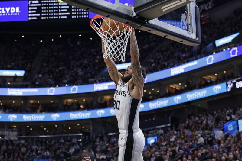 SALT LAKE CITY, UT - MARCH 27: Julian Champagnie #30 of the San Antonio Spurs dunks the ball during the game against the Utah Jazz on March 27, 2024 at Delta Center in Salt Lake City, Utah. NOTE TO USER: User expressly acknowledges and agrees that, by downloading and or using this Photograph, User is consenting to the terms and conditions of the Getty Images License Agreement. Mandatory Copyright Notice: Copyright 2024 NBAE (Photo by Chris Nicoll/NBAE via Getty Images)