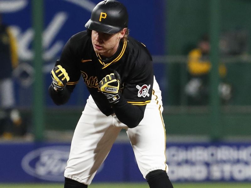 Apr 24, 2024; Pittsburgh, Pennsylvania, USA;  Pittsburgh Pirates outfielder Jack Suwinski (65) reacts at second base after hitting a double against the Milwaukee Brewers during the sixth inning at PNC Park. Mandatory Credit: Charles LeClaire-USA TODAY Sports