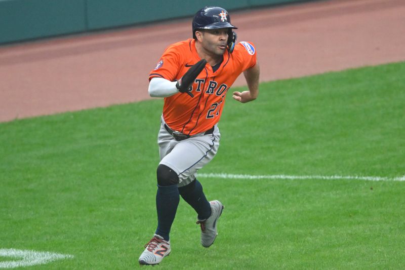 Jun 6, 2025; Cleveland, Ohio, USA; Houston Astros designated hitter Jose Altuve (27) runs the bases while scoring in the fifth inning against the Cleveland Guardians at Progressive Field. Mandatory Credit: David Richard-Imagn Images