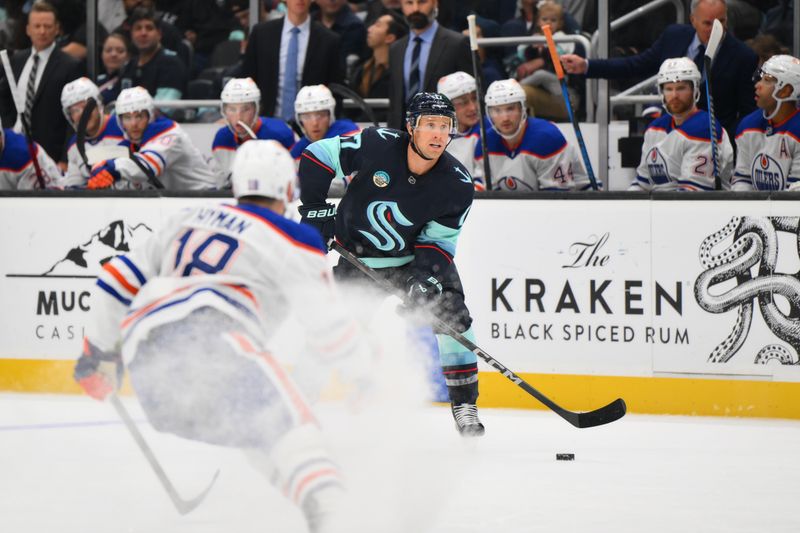 Oct 2, 2024; Seattle, Washington, USA; Seattle Kraken center Jaden Schwartz (17) plays the puck during the first period against the Edmonton Oilers at Climate Pledge Arena. Mandatory Credit: Steven Bisig-Imagn Images