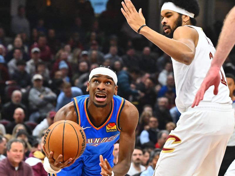 CLEVELAND, OHIO - JANUARY 08: Shai Gilgeous-Alexander #2 of the Oklahoma City Thunder shoots during the first quarter against the Cleveland Cavaliers at Rocket Mortgage Fieldhouse on January 08, 2025 in Cleveland, Ohio. NOTE TO USER: User expressly acknowledges and agrees that, by downloading and or using this photograph, User is consenting to the terms and conditions of the Getty Images License Agreement. (Photo by Jason Miller/Getty Images)