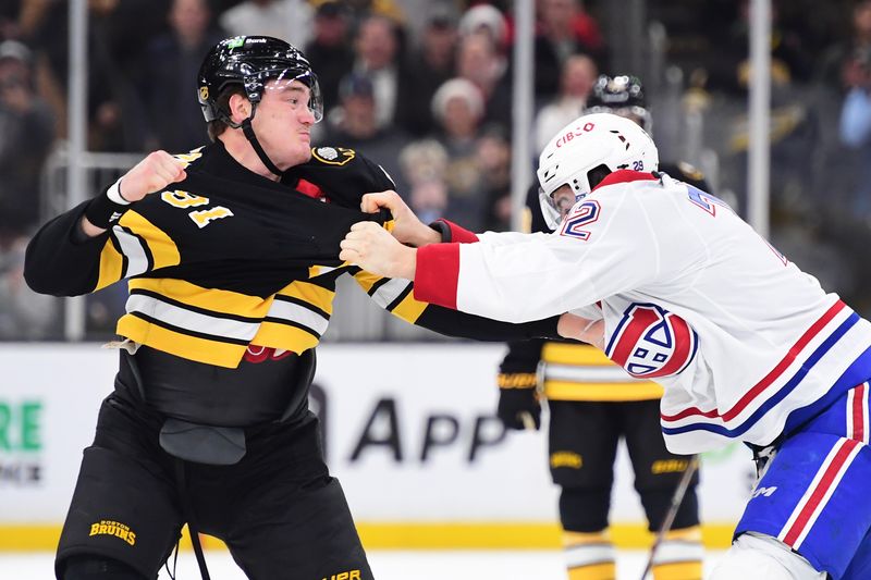 Dec 23, 2025; Boston, Massachusetts, USA; Boston Bruins defenseman Nikita Zadorov (91) fights with Montreal Canadians defenseman Arber Xhekaj (72) during the first period at TD Garden. Mandatory Credit: Bob DeChiara-Imagn Images