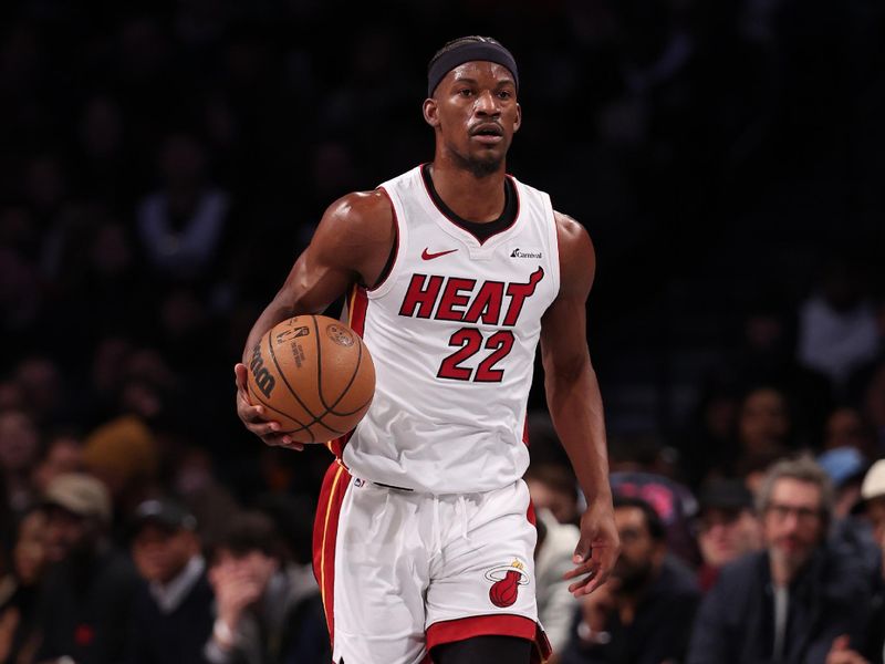 NEW YORK, NEW YORK - JANUARY 15:  Jimmy Butler #22 of the Miami Heat dibbles against the Brooklyn Nets during their game at Barclays Center on January 15, 2024 in New York City.   User expressly acknowledges and agrees that, by downloading and or using this photograph, User is consenting to the terms and conditions of the Getty Images License Agreement.  (Photo by Al Bello/Getty Images)