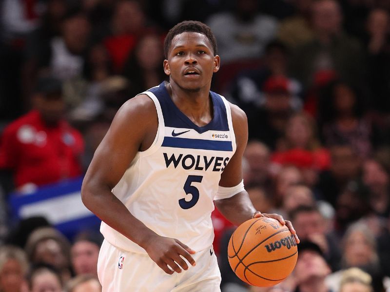 CHICAGO, ILLINOIS - NOVEMBER 07: Anthony Edwards #5 of the Minnesota Timberwolves dribbles up the court against the Chicago Bulls during the second half at the United Center on November 07, 2024 in Chicago, Illinois. NOTE TO USER: User expressly acknowledges and agrees that, by downloading and or using this photograph, User is consenting to the terms and conditions of the Getty Images License Agreement.  (Photo by Michael Reaves/Getty Images)