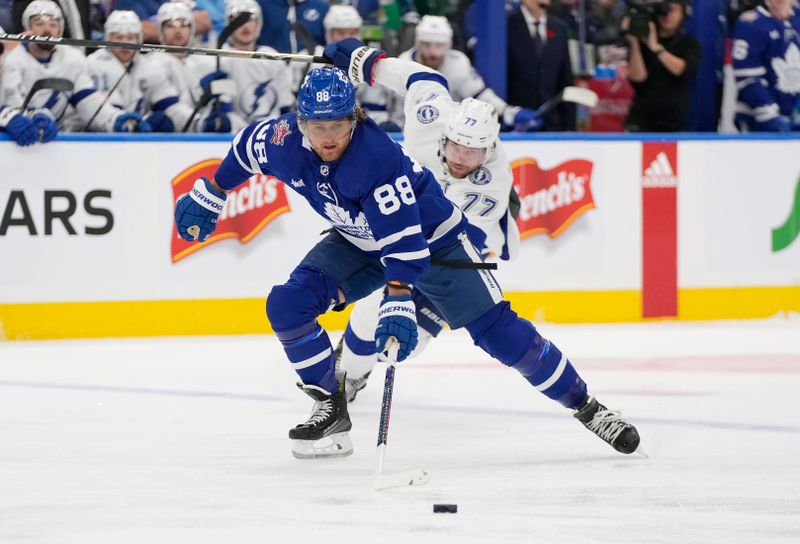 Nov 6, 2023; Toronto, Ontario, CAN; Toronto Maple Leafs forward William Nylander (88) gets past Tampa Bay Lightning defenseman Victor Hedman (77) during the first period at Scotiabank Arena. Mandatory Credit: John E. Sokolowski-USA TODAY Sports