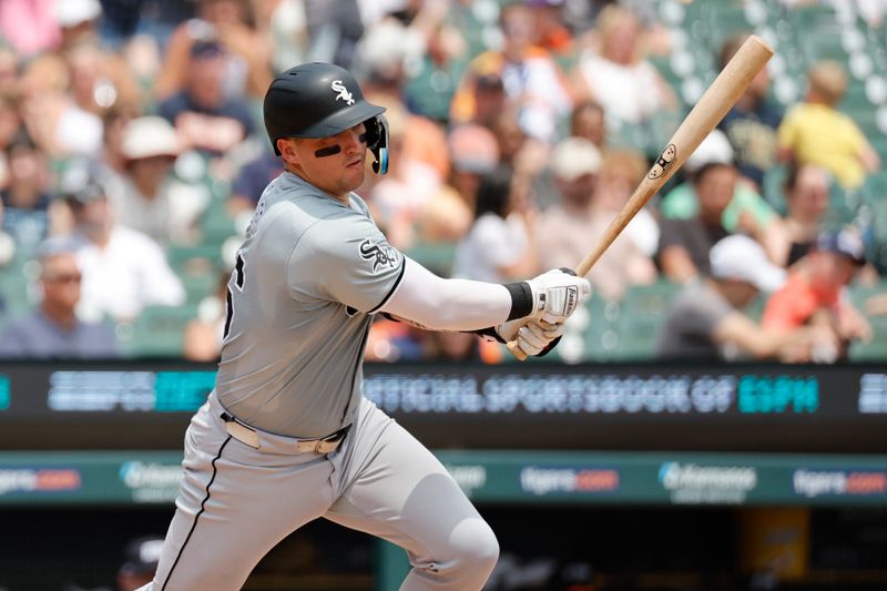 Jun 22, 2024; Detroit, Michigan, USA;  Chicago White Sox catcher Korey Lee (26) hits a single in the fourth inning against the Detroit Tigers at Comerica Park. Mandatory Credit: Rick Osentoski-USA TODAY Sports