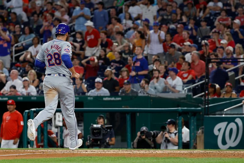 Jun 3, 2024; Washington, District of Columbia, USA; New York Mets designated hitter J.D. Martinez (28) scores a run on a throwing error by Washington Nationals pitcher Jacob Barnes (not pictured) during the sixth inning at Nationals Park. Mandatory Credit: Geoff Burke-USA TODAY Sports