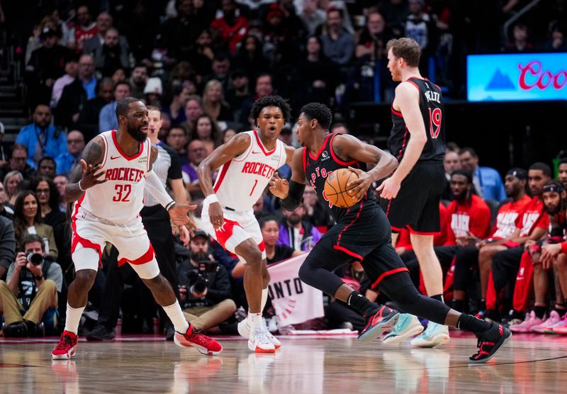 TORONTO, ON - FEBRUARY 9: RJ Barrett #9 of the Toronto Raptors drives against the Houston Rockets during the second half of their basketball game at the Scotiabank Arena on February 9, 2024 in Toronto, Ontario, Canada. NOTE TO USER: User expressly acknowledges and agrees that, by downloading and/or using this Photograph, user is consenting to the terms and conditions of the Getty Images License Agreement. (Photo by Mark Blinch/Getty Images)