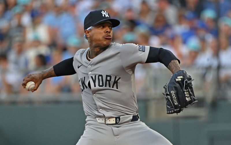 Jun 11, 2024; Kansas City, Missouri, USA; New York Yankees starting pitcher Marcus Stroman (0) delivers a pitch in the first inning against the Kansas City Royals at Kauffman Stadium. Mandatory Credit: Peter Aiken-USA TODAY Sports