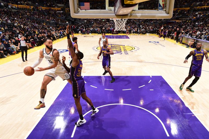 LOS ANGELES, CA - JANUARY 17: Tyrese Martin #13 of the Brooklyn Nets passes the ball during the game against the Los Angeles Lakers on January 17, 2025 at Crypto.Com Arena in Los Angeles, California. NOTE TO USER: User expressly acknowledges and agrees that, by downloading and/or using this Photograph, user is consenting to the terms and conditions of the Getty Images License Agreement. Mandatory Copyright Notice: Copyright 2025 NBAE (Photo by Adam Pantozzi/NBAE via Getty Images)