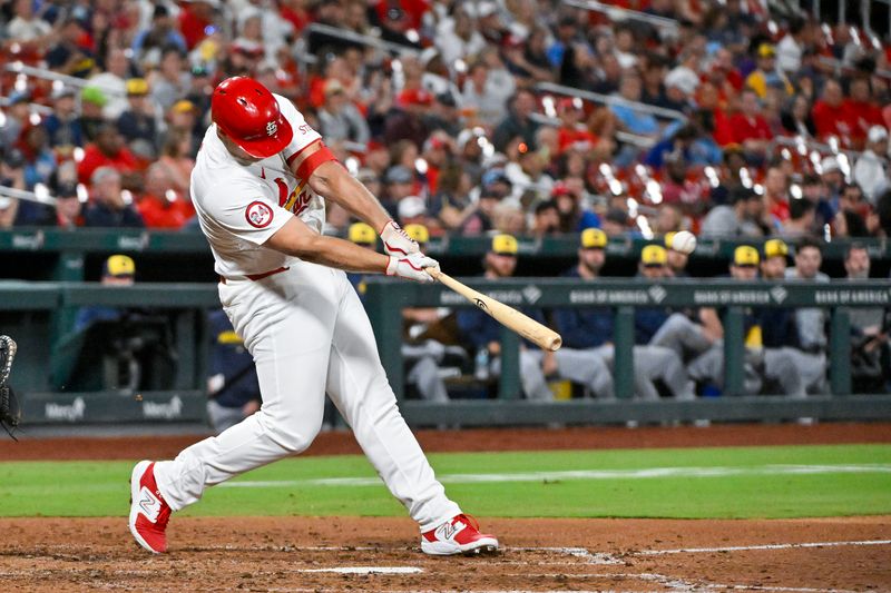 Aug 21, 2024; St. Louis, Missouri, USA;  St. Louis Cardinals pinch hitter Luken Baker (26) hits a two run home run against the Milwaukee Brewers during the seventh inning at Busch Stadium. Mandatory Credit: Jeff Curry-USA TODAY Sports