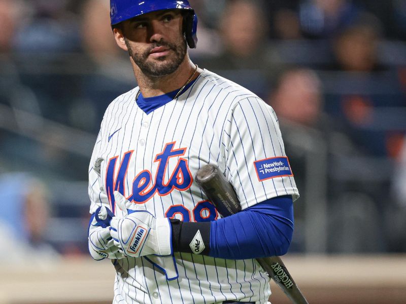 Apr 26, 2024; New York City, New York, USA; New York Mets designated hitter J.D. Martinez (28) reacts after striking out during the fourth inning against the St. Louis Cardinals during the first inning at Citi Field. Mandatory Credit: Vincent Carchietta-USA TODAY Sports