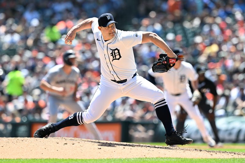 Jun 28, 2025; Detroit, Michigan, USA;  Detroit Tigers pitcher Tommy Kahnle (43) throws a pitch against the Minnesota Twins in the seventh inning at Comerica Park. Mandatory Credit: Lon Horwedel-Imagn Images