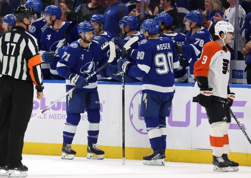 Nov 24, 2025; Tampa, Florida, USA; Tampa Bay Lightning center Anthony Cirelli (71) is congratulated after he scored a goal against the Philadelphia Flyers during the second period at Benchmark International Arena. Mandatory Credit: Kim Klement Neitzel-Imagn Images