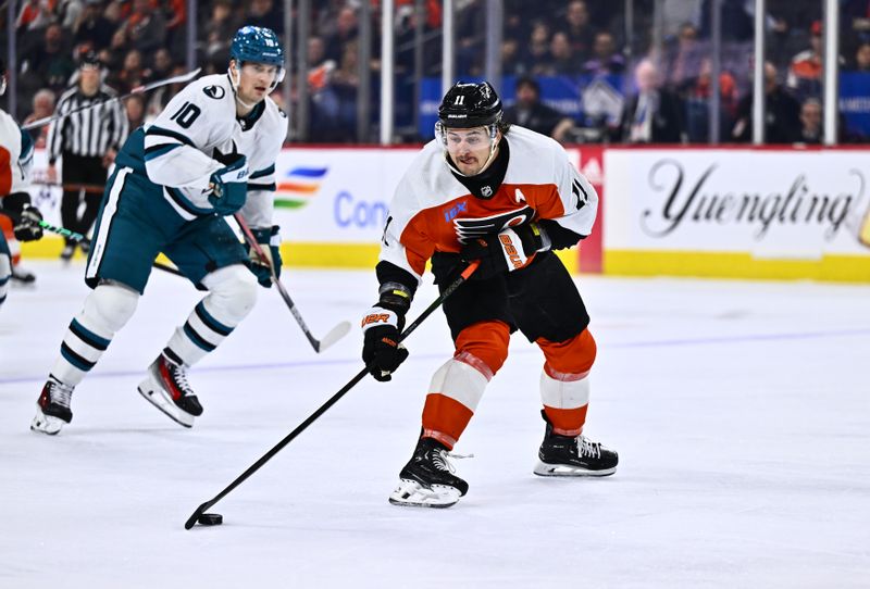 Mar 12, 2024; Philadelphia, Pennsylvania, USA; Philadelphia Flyers right wing Travis Konecny (11) controls the puck against the San Jose Sharks in the third period at Wells Fargo Center. Mandatory Credit: Kyle Ross-USA TODAY Sports