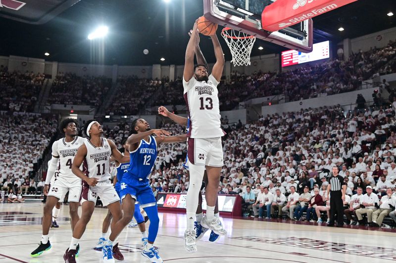 Feb 15, 2023; Starkville, Mississippi, USA; Mississippi State Bulldogs forward Will McNair Jr. (13) goes up for a rebound against Kentucky Wildcats during the first half at Humphrey Coliseum. Mandatory Credit: Matt Bush-USA TODAY Sports