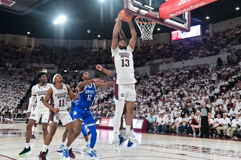 Feb 15, 2023; Starkville, Mississippi, USA; Mississippi State Bulldogs forward Will McNair Jr. (13) goes up for a rebound against Kentucky Wildcats during the first half at Humphrey Coliseum. Mandatory Credit: Matt Bush-USA TODAY Sports