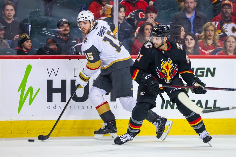 Mar 14, 2024; Calgary, Alberta, CAN; Vegas Golden Knights defenseman Noah Hanifin (15) controls the puck against Calgary Flames center Nazem Kadri (91) during the second period at Scotiabank Saddledome. Mandatory Credit: Sergei Belski-USA TODAY Sports