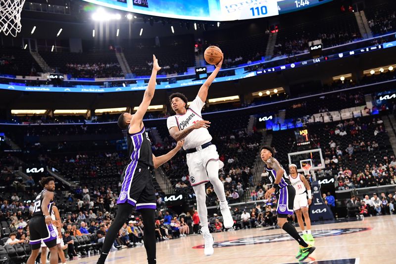 INGLEWOOD, CA - OCTOBER 17: Jordan Miller #11 of the LA Clippers drives to the basket during the game against the Sacramento Kings during a NBA Preseason game on October 17, 2024 at Intuit Dome in Los Angeles, California. NOTE TO USER: User expressly acknowledges and agrees that, by downloading and/or using this Photograph, user is consenting to the terms and conditions of the Getty Images License Agreement. Mandatory Copyright Notice: Copyright 2024 NBAE (Photo by Adam Pantozzi/NBAE via Getty Images)