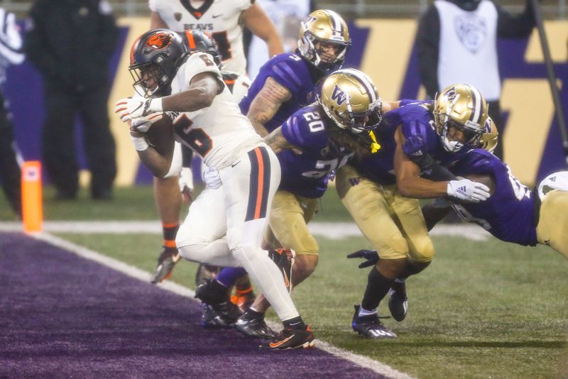 Nov 14, 2020; Seattle, Washington, USA; Oregon State Beavers running back Jermar Jefferson (6) rushes for a touchdown against the Washington Huskies during the second quarter at Alaska Airlines Field at Husky Stadium. Mandatory Credit: Joe Nicholson-USA TODAY Sports