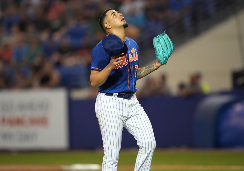 Feb 25, 2023; Port St. Lucie, Florida, USA;  New York Mets pitcher Jose Butto (70) leaves the game against the Miami Marlins in the second inning at Clover Park. Mandatory Credit: Jim Rassol-USA TODAY Sports