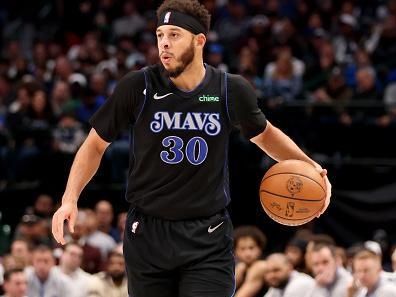 DALLAS, TEXAS - DECEMBER 27: Seth Curry #30 of the Dallas Mavericks dribbles the ball against the Cleveland Cavaliers at American Airlines Center on December 27, 2023 in Dallas, Texas. NOTE TO USER: User expressly acknowledges and agrees that, by downloading and or using this photograph, User is consenting to the terms and conditions of the Getty Images License Agreement. (Photo by Tim Heitman/Getty Images)