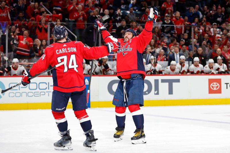 Feb 26, 2024; Washington, District of Columbia, USA; Washington Capitals defenseman John Carlson (74) celebrates with Capitals left wing Alex Ovechkin (8) after scoring a goal against the Ottawa Senators in the first period at Capital One Arena. Mandatory Credit: Geoff Burke-USA TODAY Sports