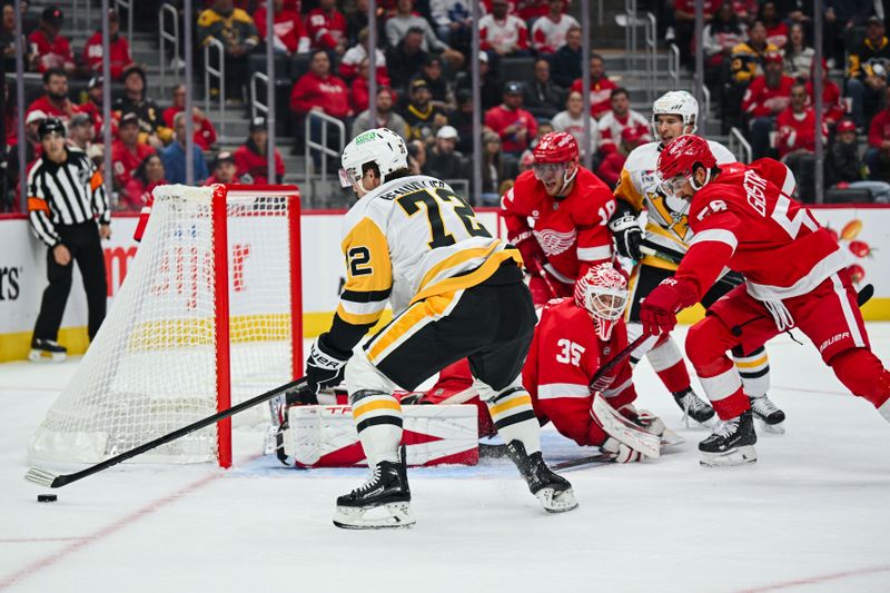 Oct 10, 2024; Detroit, Michigan, USA; Pittsburgh Penguins left wing Anthony Beauvillier (72) scores a goal as Detroit Red Wings goaltender Ville Husso (35) tends the net during the first period at Little Caesars Arena. Mandatory Credit: Tim Fuller-Imagn Images