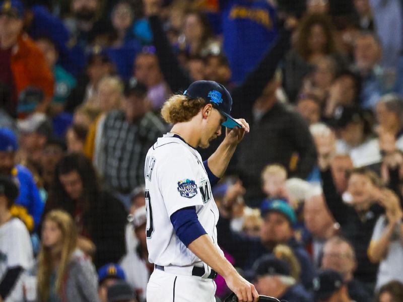 Jun 18, 2023; Seattle, Washington, USA; Seattle Mariners starting pitcher Bryce Miller (50) walks to the dugout after getting the final out of the top of the seventh inning against the Chicago White Sox at T-Mobile Park. Mandatory Credit: Joe Nicholson-USA TODAY Sports