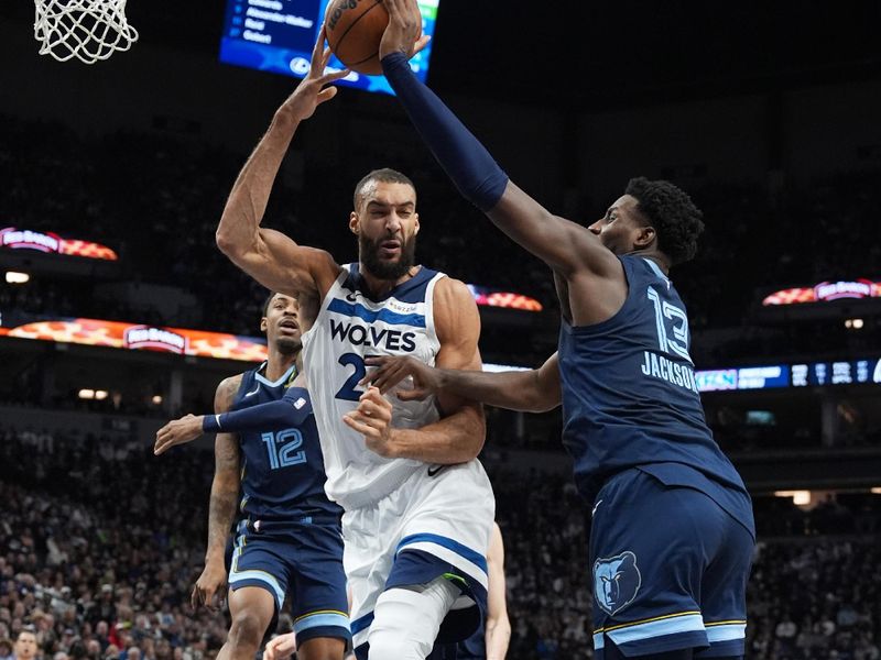 MINNEAPOLIS, MN -  JANUARY 11: Jaren Jackson Jr. #13 of the Memphis Grizzlies blocks the ball during the game against the Minnesota Timberwolves on January 11, 2025 at Target Center in Minneapolis, Minnesota. NOTE TO USER: User expressly acknowledges and agrees that, by downloading and or using this Photograph, user is consenting to the terms and conditions of the Getty Images License Agreement. Mandatory Copyright Notice: Copyright 2025 NBAE (Photo by Jordan Johnson/NBAE via Getty Images)