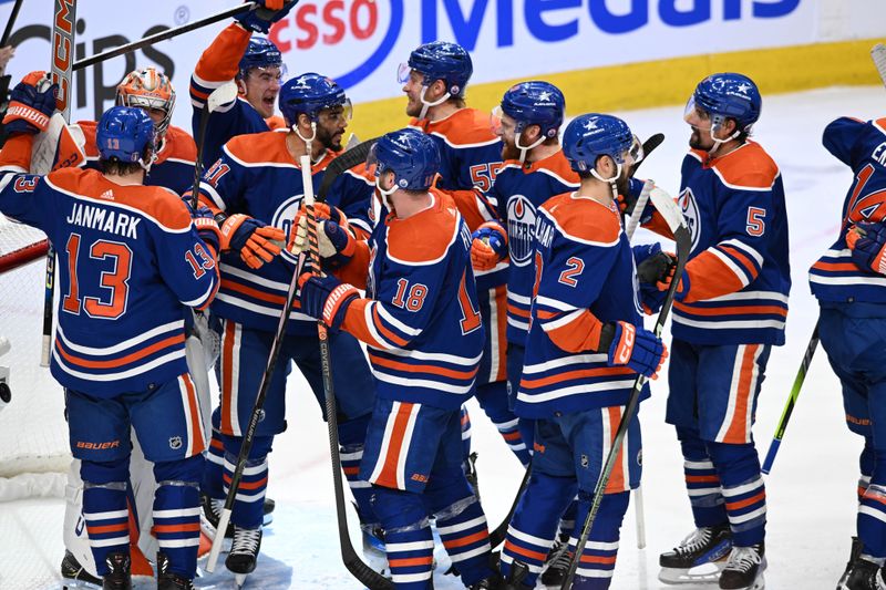 Jun 2, 2024; Edmonton, Alberta, CAN; Edmonton Oilers players celebrate thier win over the Dallas Stars during the third period in game six of the Western Conference Final of the 2024 Stanley Cup Playoffs at Rogers Place. Mandatory Credit: Walter Tychnowicz-USA TODAY Sports