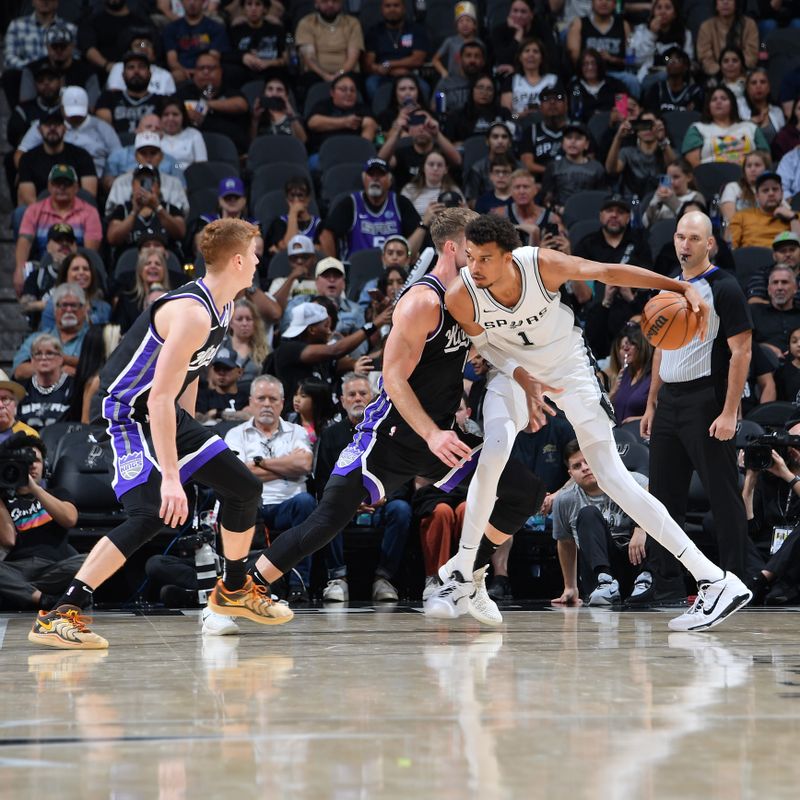 SAN ANTONIO, TX - NOVEMBER 11:  Victor Wembanyama #1 of the San Antonio Spurs dribbles the ball during the game against the Sacramento Kings during a regular season game on November 11, 2024 at the Frost Bank Center in San Antonio, Texas. NOTE TO USER: User expressly acknowledges and agrees that, by downloading and or using this photograph, user is consenting to the terms and conditions of the Getty Images License Agreement. Mandatory Copyright Notice: Copyright 2024 NBAE (Photos by Michael Gonzales/NBAE via Getty Images)