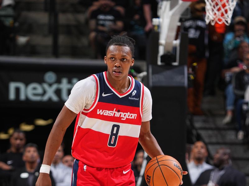 SAN ANTONIO, TX - NOVEMBER 13: Bub Carrington #8 of the Washington Wizards dribbles the ball during the game against the San Antonio Spurs  on November 13, 2024 at the Frost Bank Center in San Antonio, Texas. NOTE TO USER: User expressly acknowledges and agrees that, by downloading and or using this photograph, user is consenting to the terms and conditions of the Getty Images License Agreement. Mandatory Copyright Notice: Copyright 2024 NBAE (Photos byGarrett Ellwood/NBAE via Getty Images)