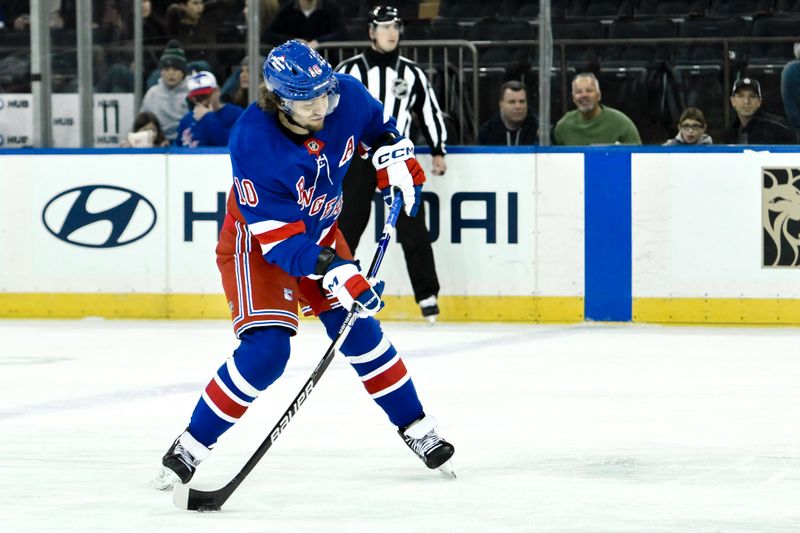 Nov 30, 2024; New York, New York, USA; New York Rangers left wing Artemi Panarin (10) shoots the puck against the Montreal Canadiens during the first period at Madison Square Garden. Mandatory Credit: John Jones-Imagn Images