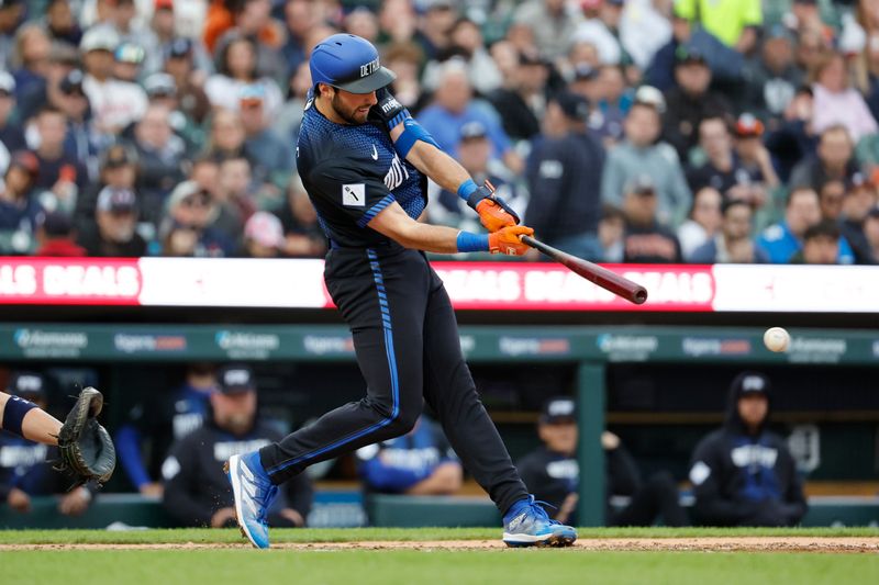 May 10, 2024; Detroit, Michigan, USA;  Detroit Tigers third base Matt Vierling (8) hits a two-run RBI double in the third inning against the Houston Astros at Comerica Park. Mandatory Credit: Rick Osentoski-USA TODAY Sports